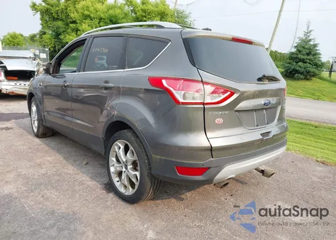 2013 Ford Escape Titanium z USA, uszkodzony, nr VIN 1FMCU9J96DUD74870